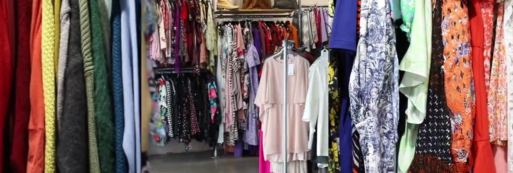 clothes hanging on racks